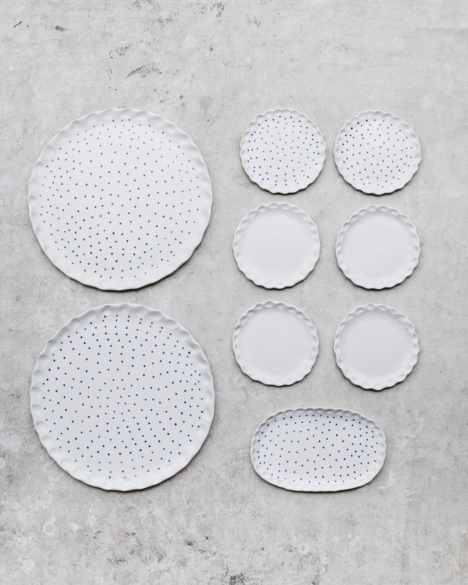 scallop rim blue spot freckled cake plates handmade by clay beehive ceramics