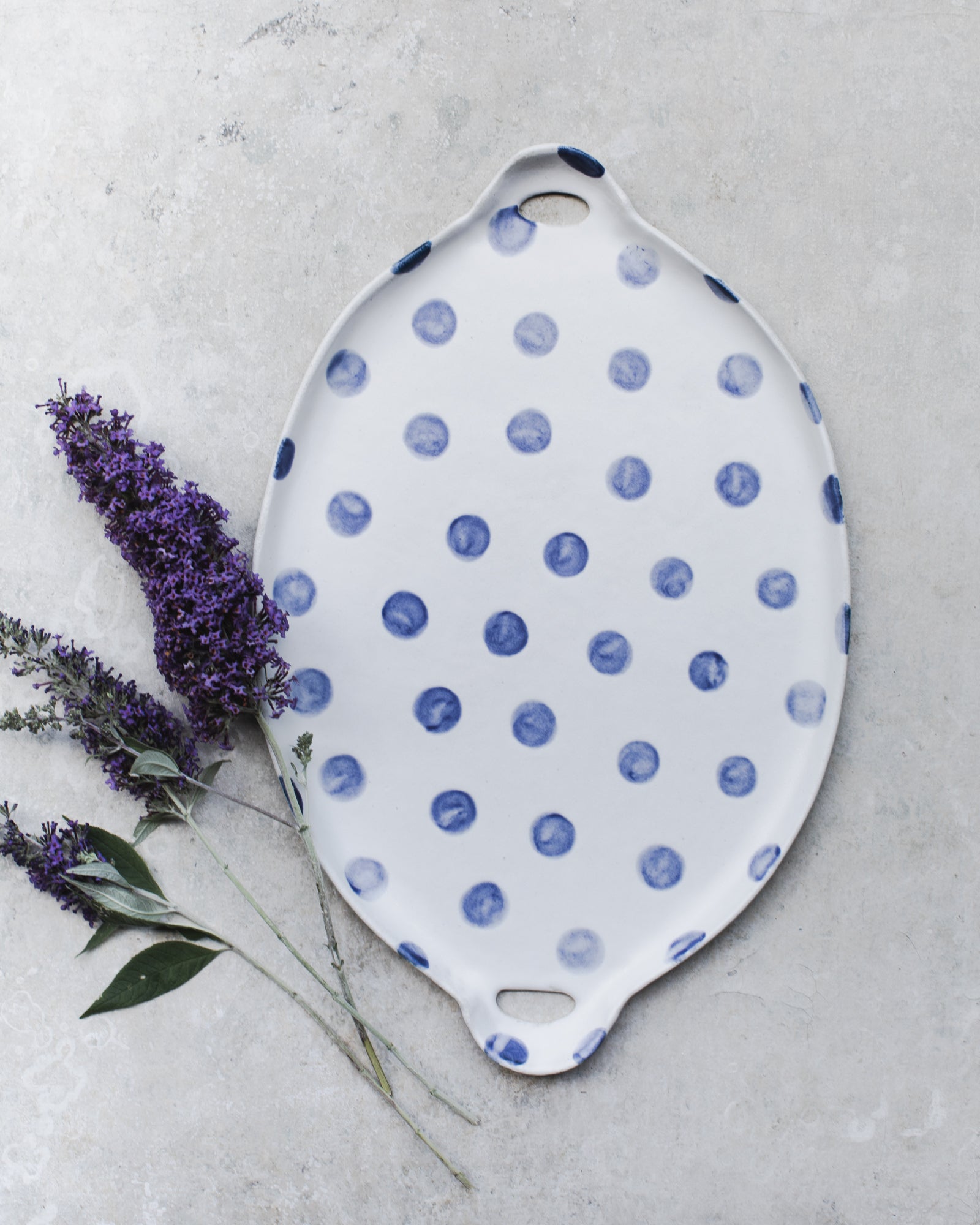 Large handled polka dot platter with easy grip handles handmade by clay beehive ceramics