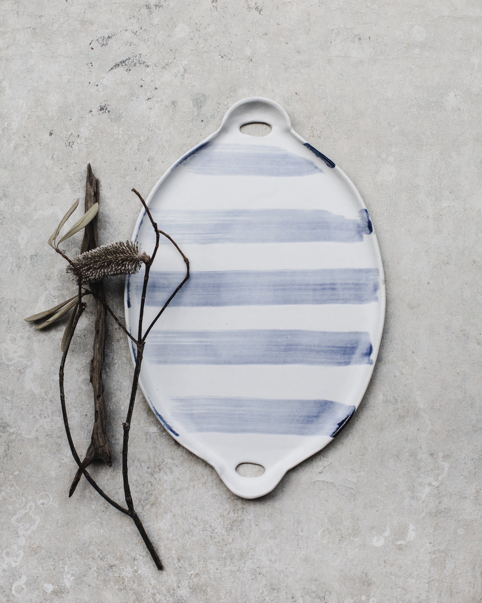 nautical lines platter with cut out handles perfect as a cheese board handmade by clay beehive ceramics