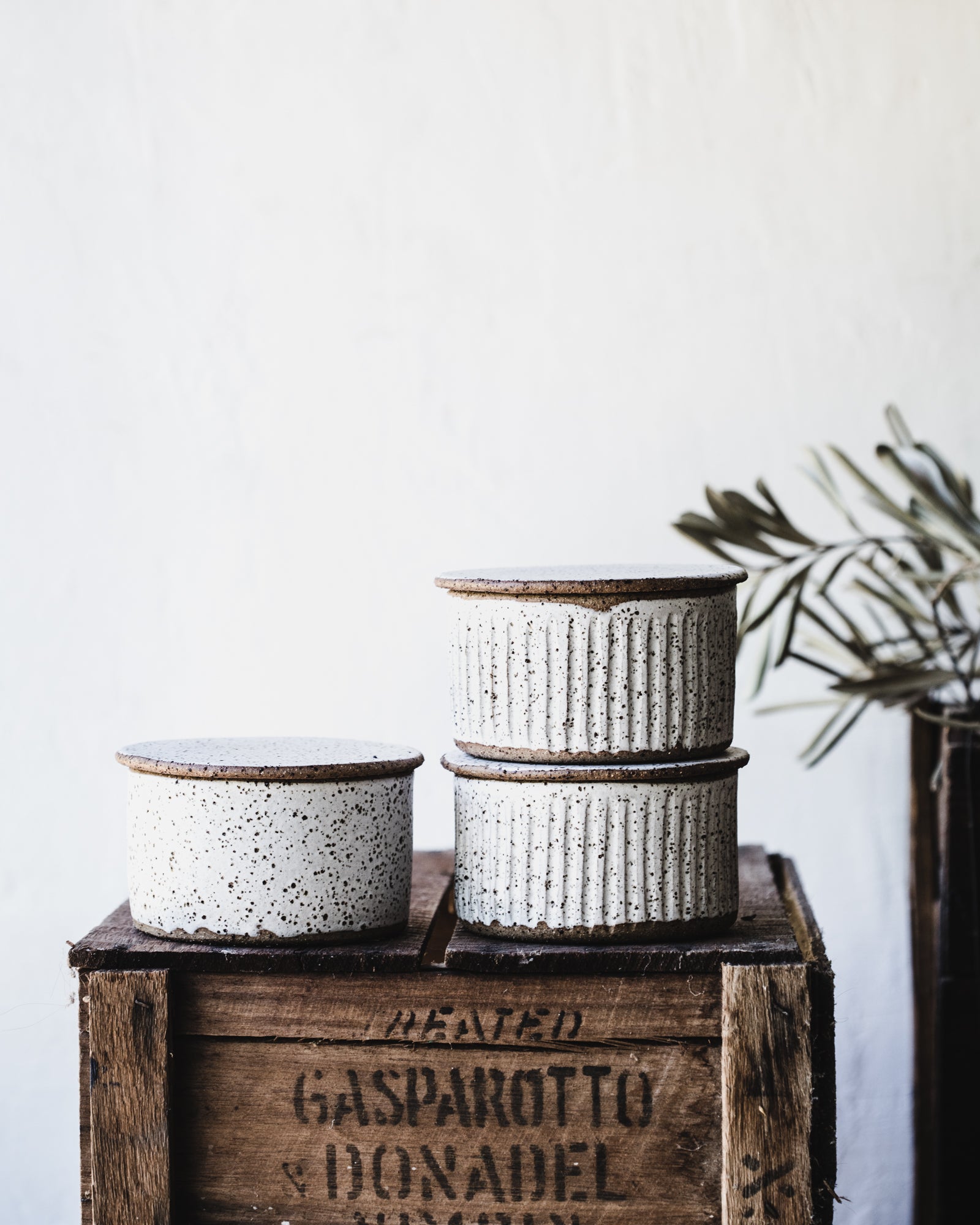 Rustic speckled white french style fluted butter bells by clay beehive ceramics