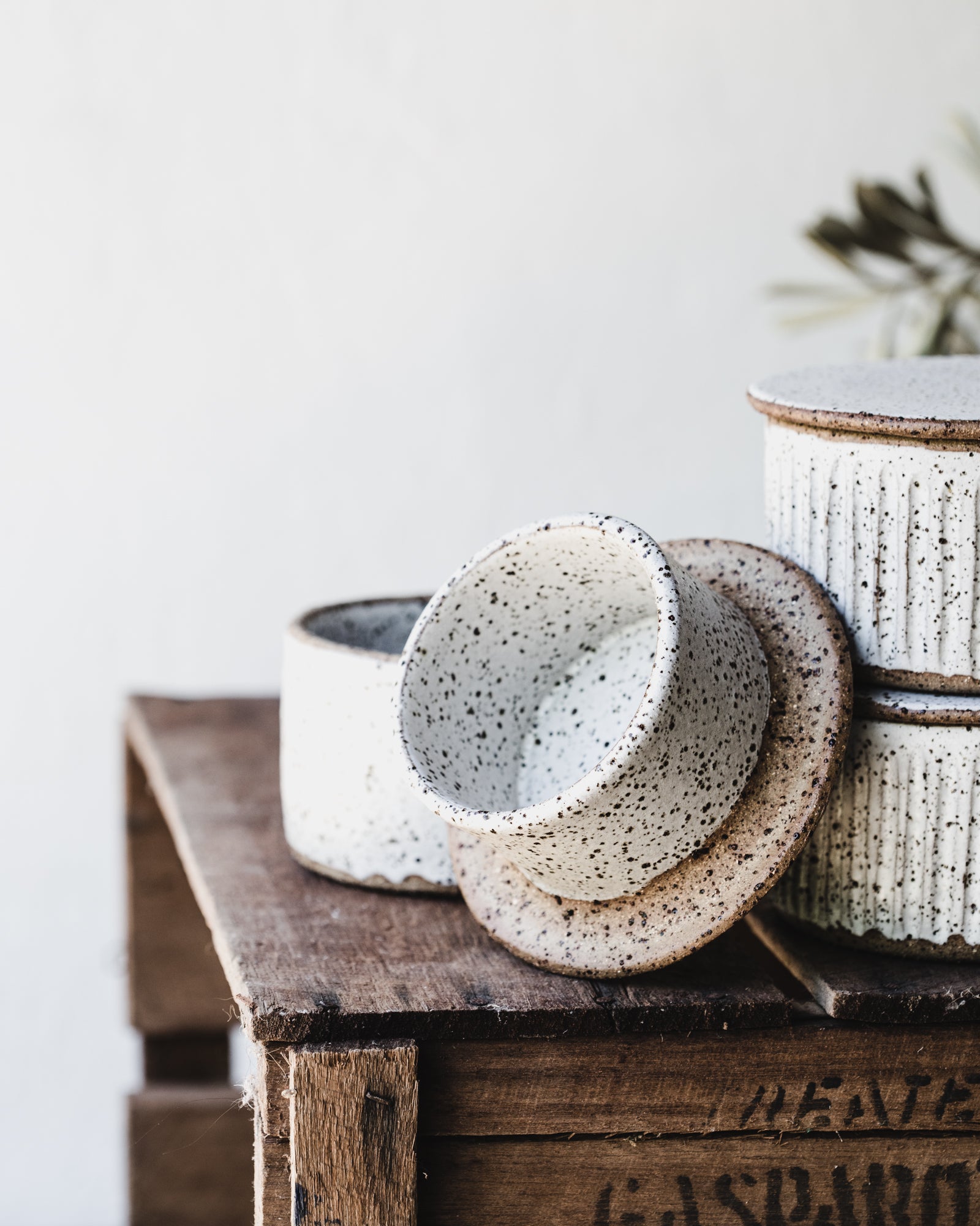 Rustic speckled white french style fluted butter bells by clay beehive ceramics
