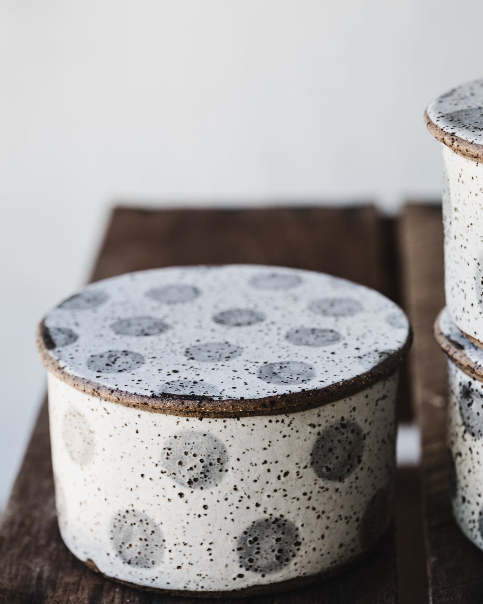 Rustic speckled french style butter bells with various patterns in grey and white by clay beehive ceramics