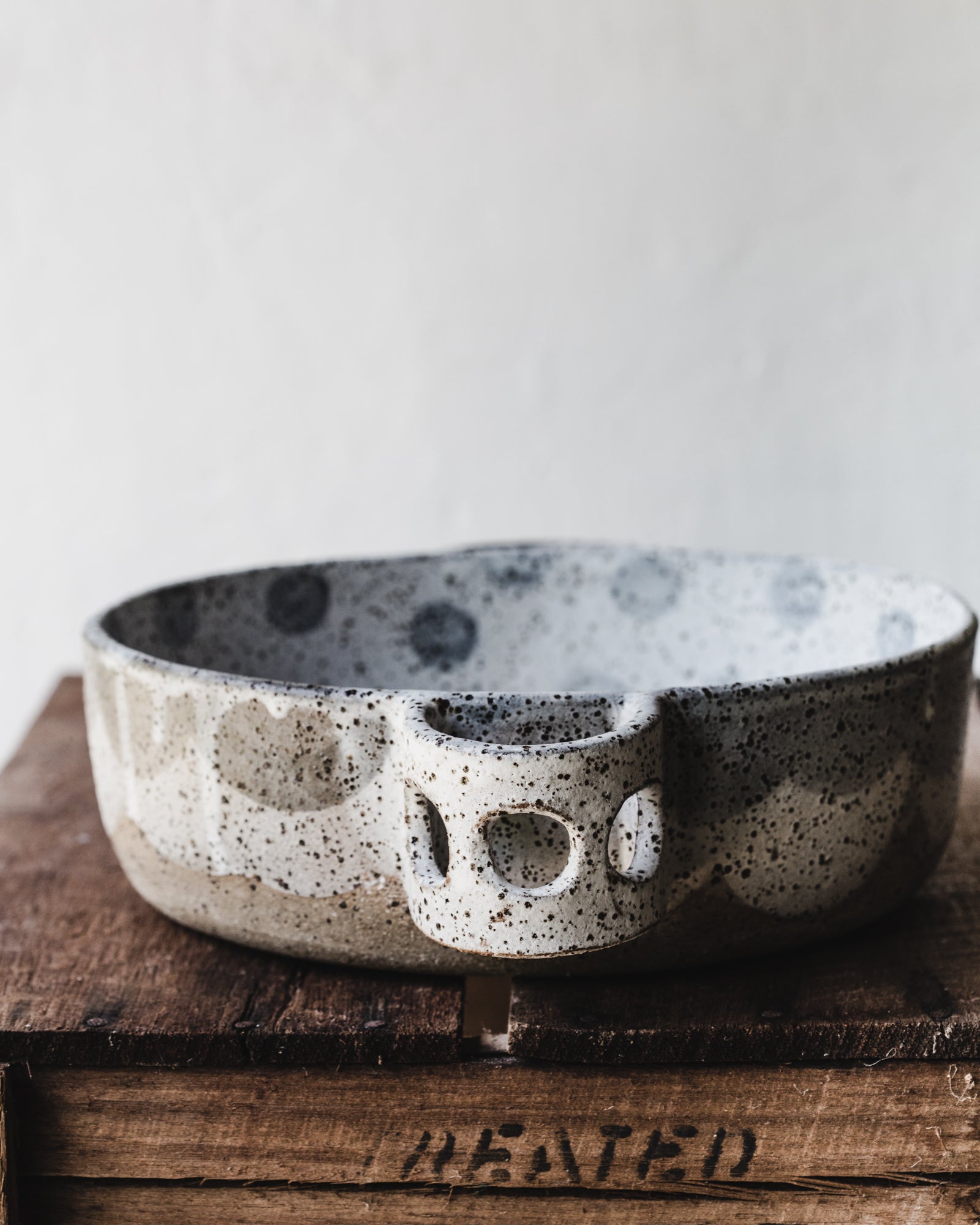 Rustic polka dot baking dish with handles hand made by clay beehive ceramics
