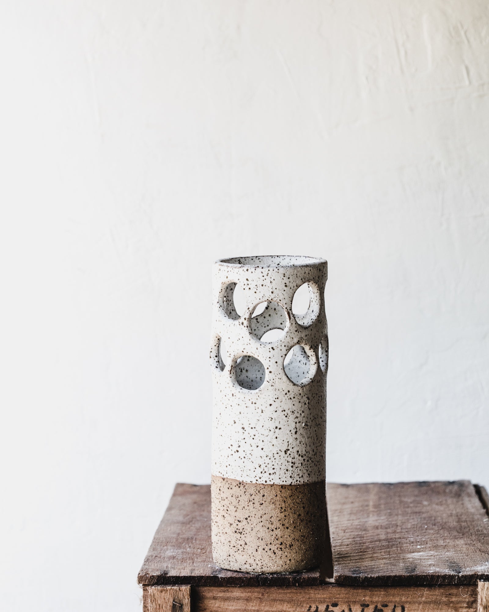 Large rustic cutout circles speckled white vase by clay beehive ceramics