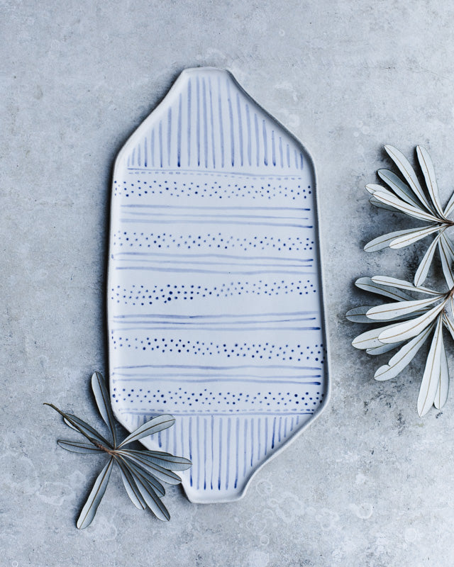 rectangular platter with spots and stripes in blue and white by clay beehive ceramics