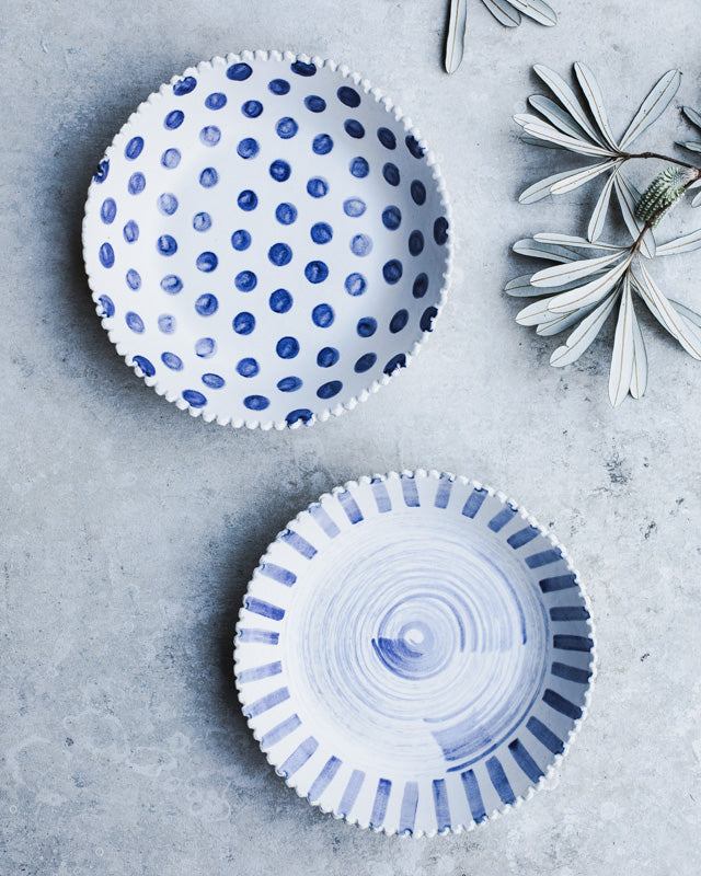 blue and white scallop rim bowls handmade by clay beehive ceramics