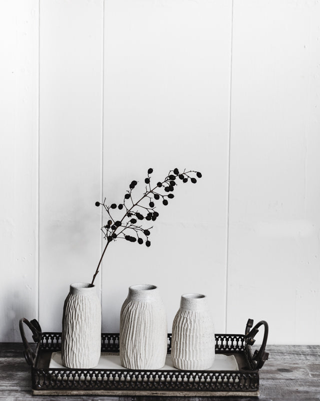 speckled white faceted bud vases wheelthrown by clay beehive ceramics