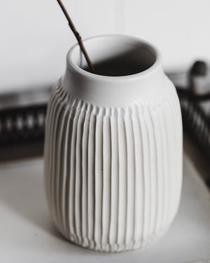 Carved white vase handmade by clay beehive ceramics