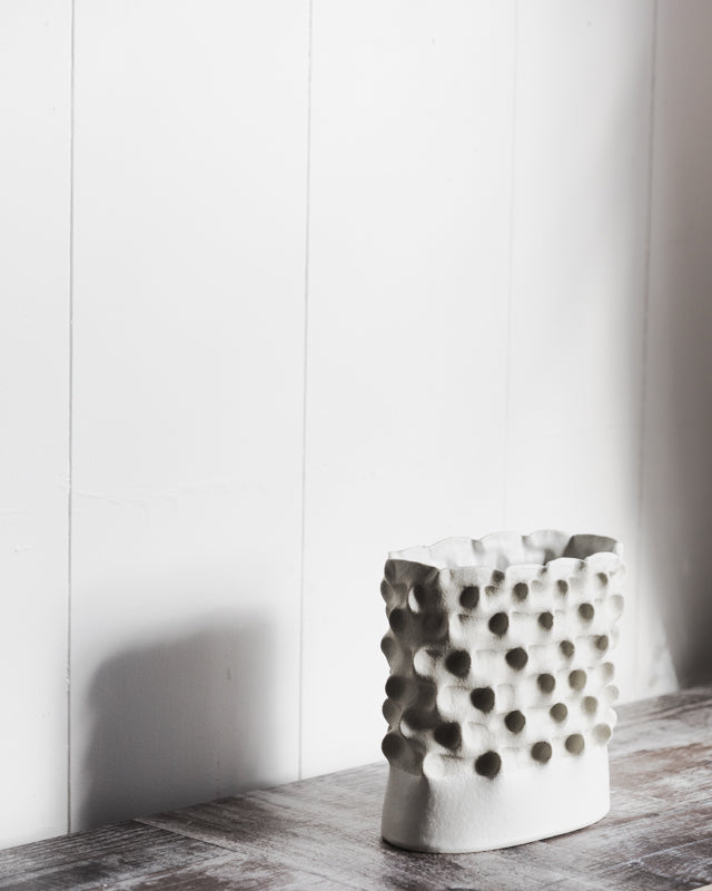 Large white sculptural pinched textured vases