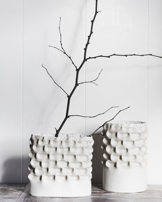 Large white sculptural pinched textured vases