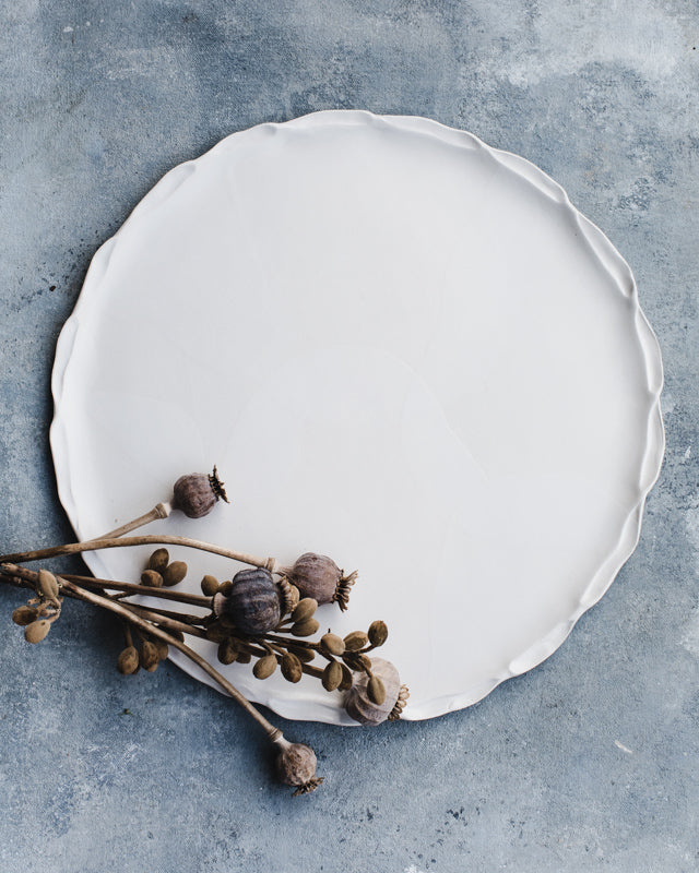 Satin white handmade platter with earthy organic shaped rim crafted by clay beehive ceramics