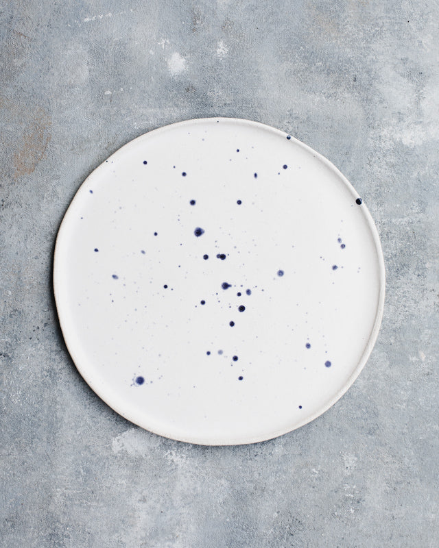 handmade ceramic plate with blue splatter by clay beehive ceramics