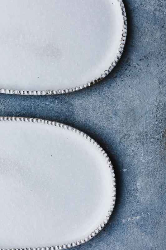textured rim oval plates with satin white finish by clay beehive ceramics