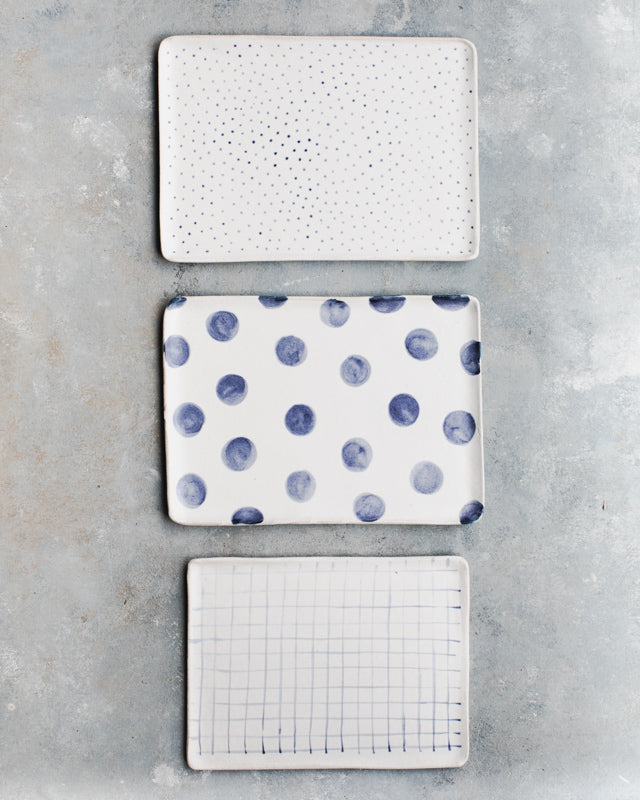 rectangular plates with blue and white decoration handmade by clay beehive ceramics