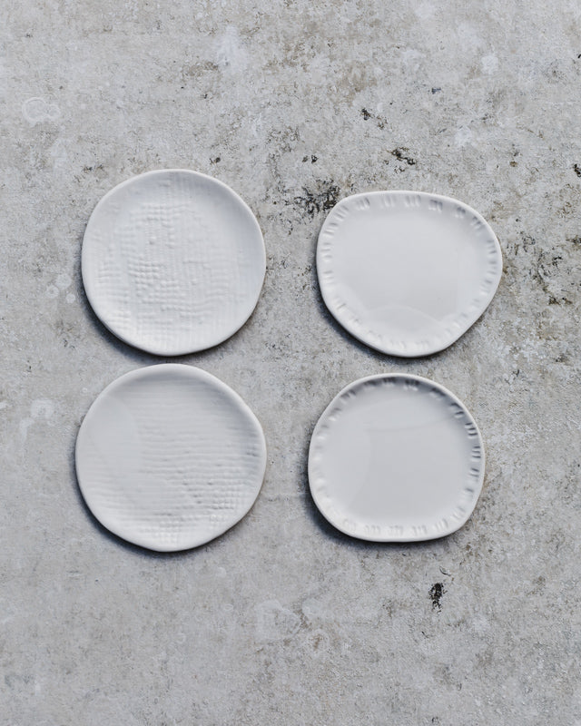 Tiny satin white plates