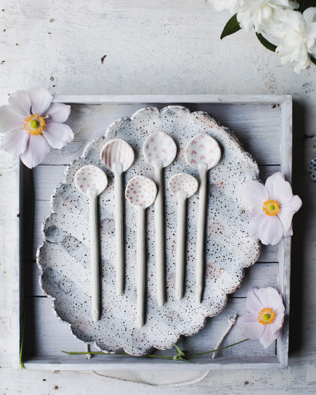 handmade ceramic spoons with soft pink decorations by clay beehive ceramics
