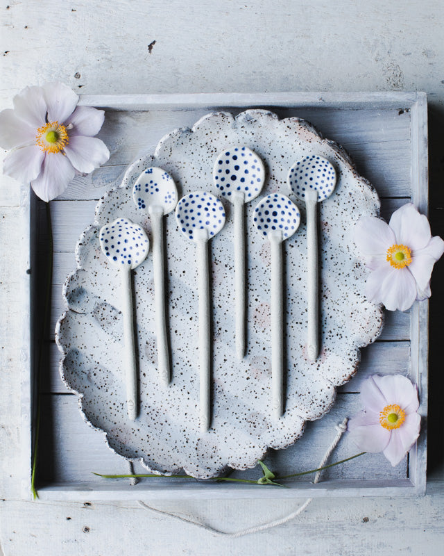 Hand made ceramic blue spot spoons by clay beehive