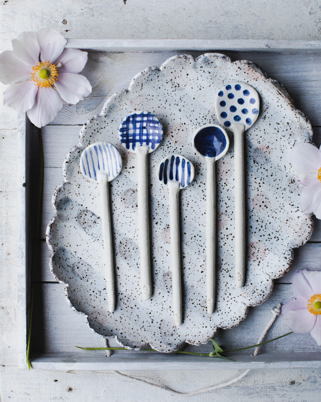 Blue and white hand made ceramic spoons by clay beehive