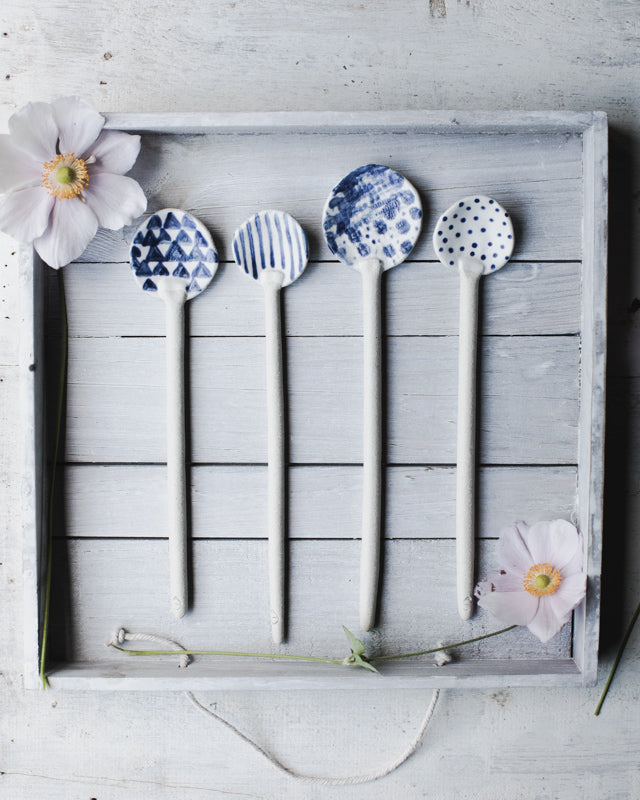 blue and white ceramic spoons by clay beehive ceramics