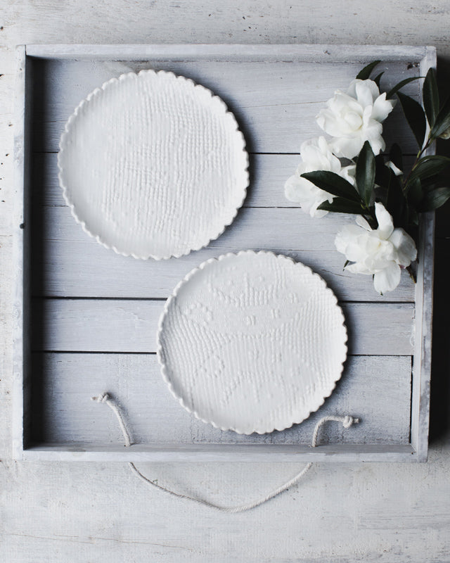 Scalloped rim white hand made plates with fabric texture by clay beehive ceramics