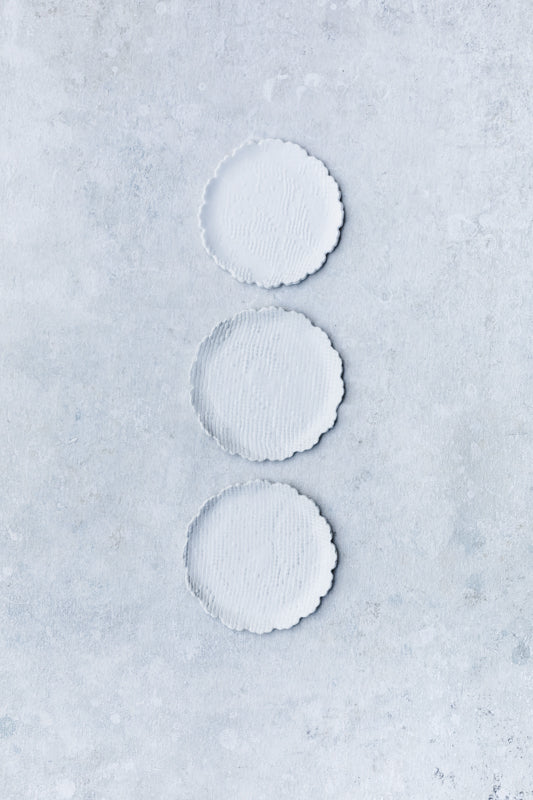 scallop rim textured plates in satin white hand made by clay beehive