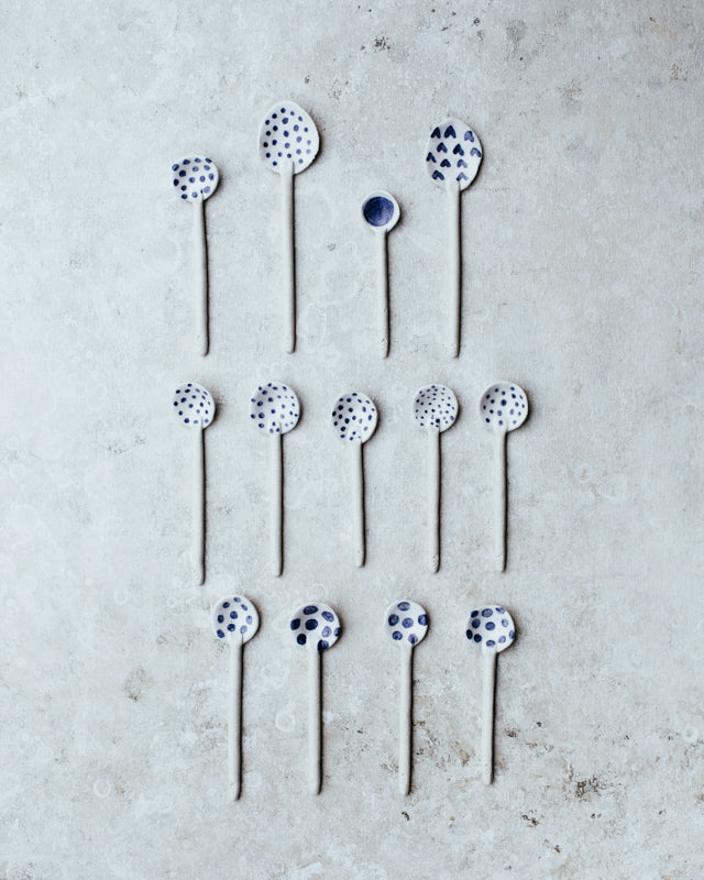 blue and white ceramic handmade ceramic spoons by clay beehive