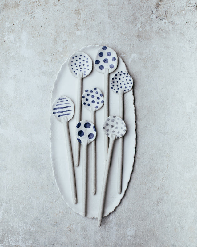 Long handled large hand made ceramic spoons by clay beehive