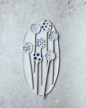 Long handled large hand made ceramic spoons by clay beehive