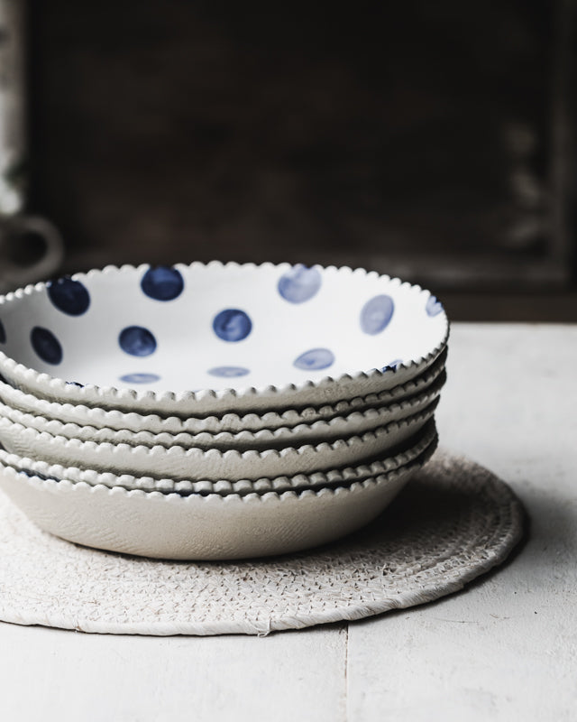 Navy and White large ceramic bowls with a blue spot and fabric textured exterior handmade by Clay Beehive 