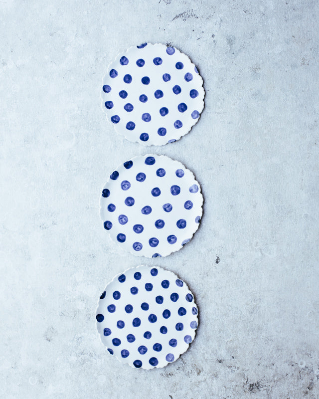 Navy polka dot hand made scalloped rim cake plates by clay beehive ceramics