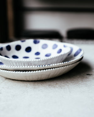 navy blue spot bowls  with textured rims hand made by clay beehive ceramics