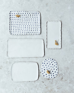 rectangular shaped hand made ceramic plates with textured edging blue and white by clay beehve 