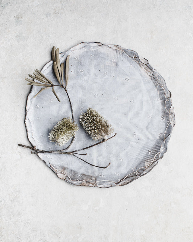 Large platter plate with carved rim and raked textures by clay beehive ceramics