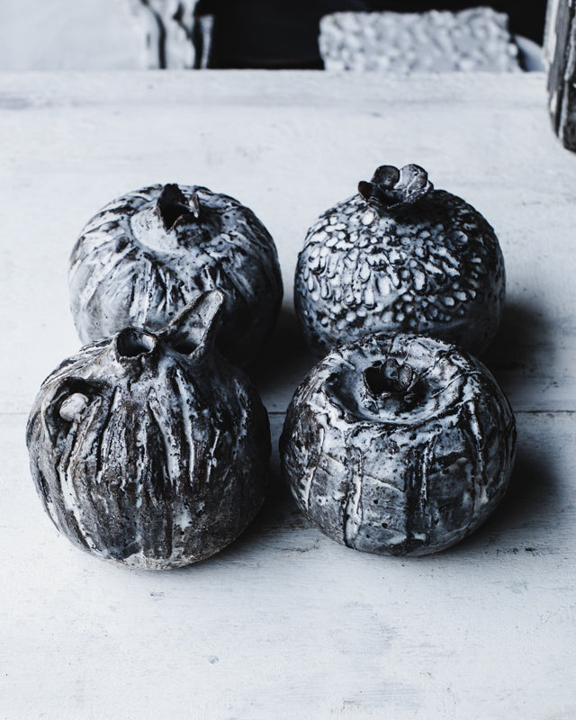 Bud vases hand made and textured and carved with rustic markings in grey white and brown clay body by clay beehive ceramics