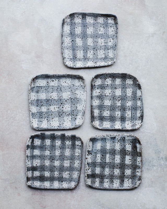 Square rustic gritty plates with tartan pattern glaze by clay beehive