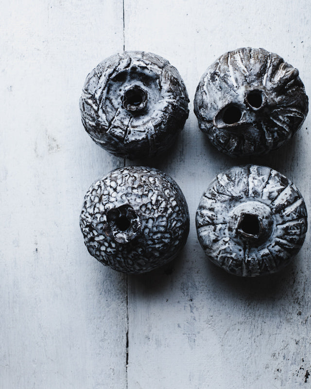 Bud vases hand made and textured and carved with rustic markings in grey white and brown clay body by clay beehive ceramics