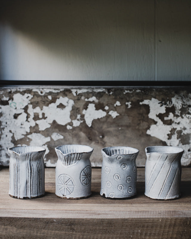 Hand made ceramic farmhouse pourers/jugs by clay beehive in rustic grey white matte glaze