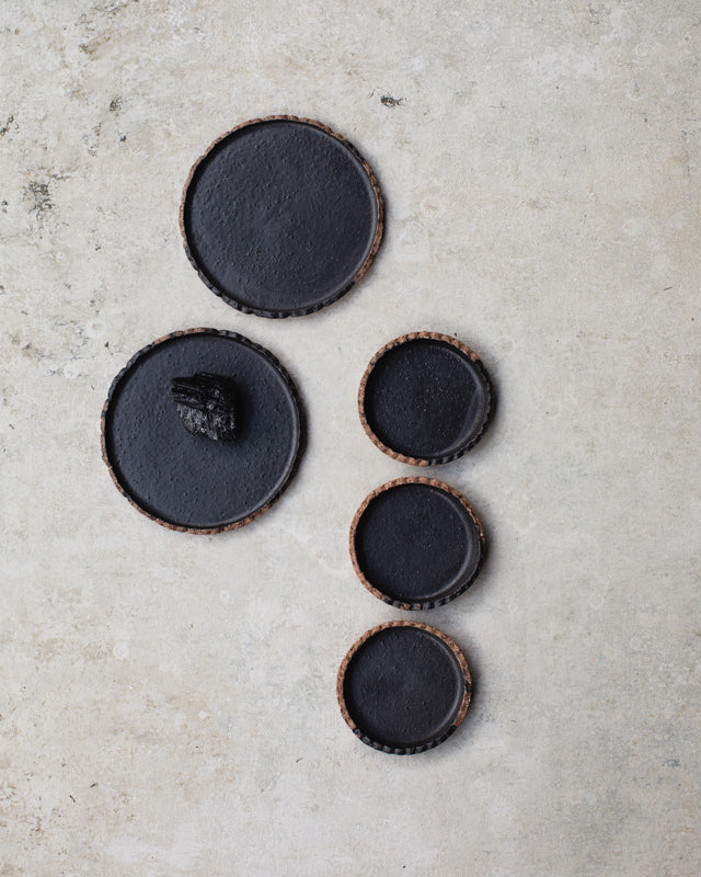 Rustic gritty satin black scallop rim plates