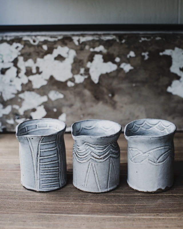 Hand made ceramic farmhouse pourers/jugs by clay beehive in rustic grey white matte glaze