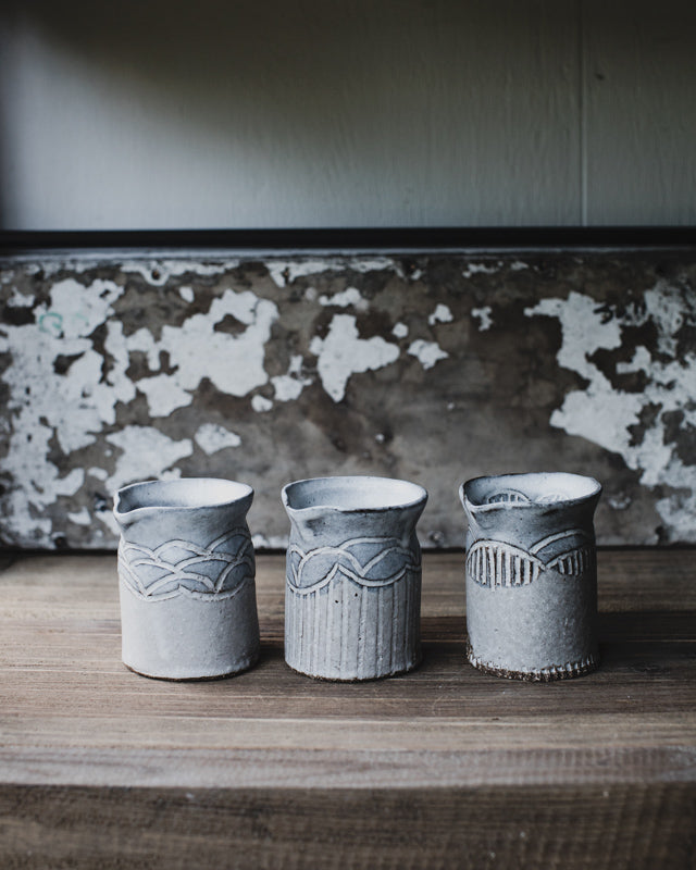 Hand made ceramic farmhouse pourers/jugs by clay beehive in rustic grey white matte glaze