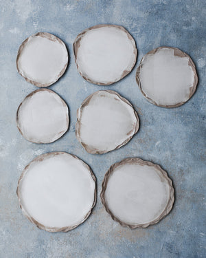 earthy organic shaped rim with satin white glazed plates by clay beehive ceramics