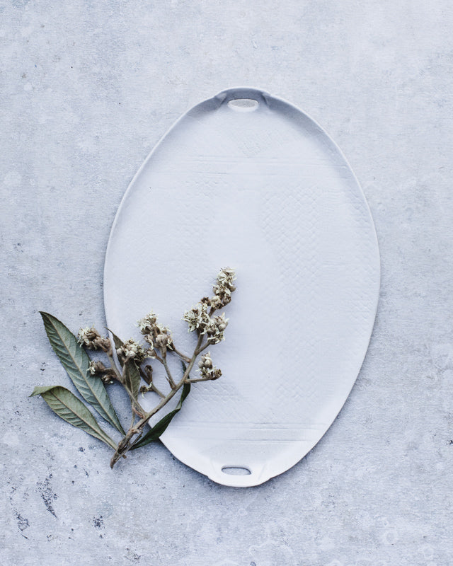 Large satin white platter with textured surface and cut out handles perfect for entertaining by clay beehive