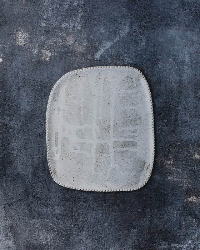 Drippy White grid Platter with detailed edging by clay beehive