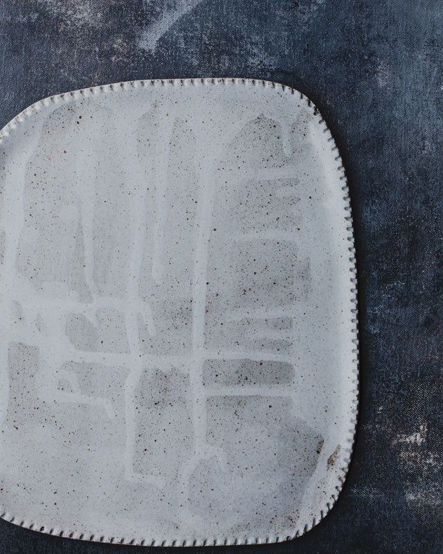 Drippy White grid Platter with detailed edging by clay beehive