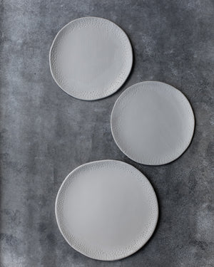 ceramic hand-crafted carved plates for cakes and beautiful food for food photography and ceramic lovers by clay beehive
