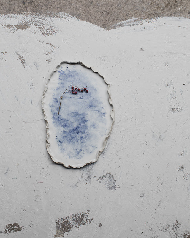 oval ceramic plate blue and white frilly rims by clay beehive pottery