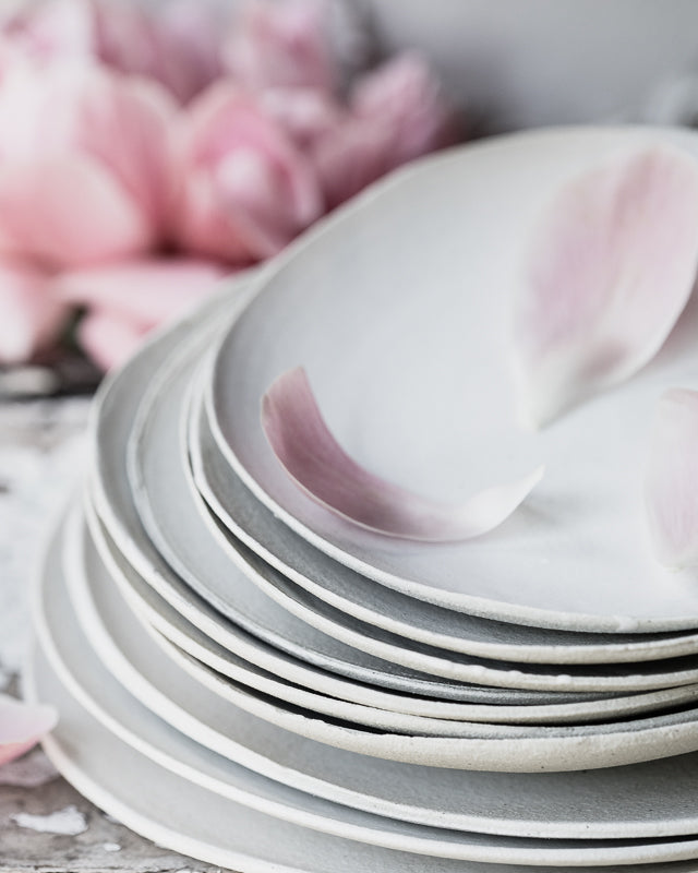 organic shallow bowls made from gritty white clay and glazed in satin white by clay beehive ceramics