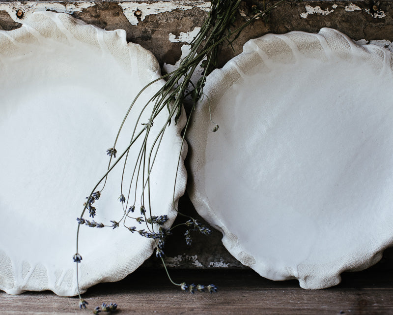 textured fabric ceramic bowls and plates hand made with frilly edges by clay beehive ceramic
