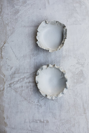 textured fabric ceramic bowls and plates hand made with frilly edges by clay beehive ceramic