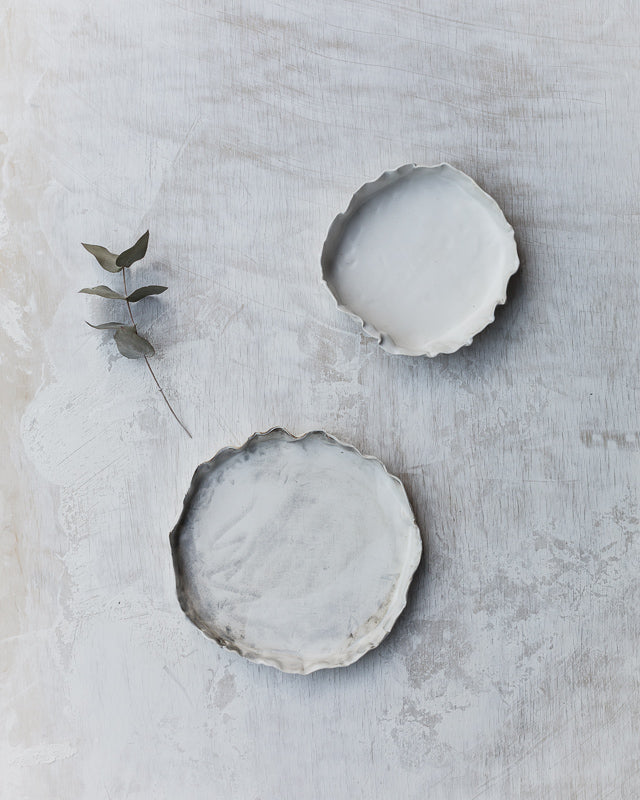 organic shaped plates with high rims hand made by clay beehive ceramics